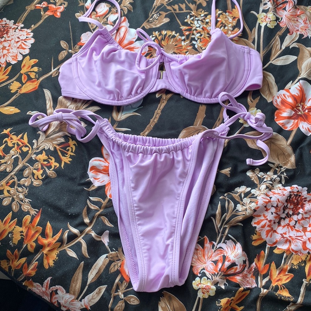 Lilac color two piece bikini The bottom is a medium and the top is a large